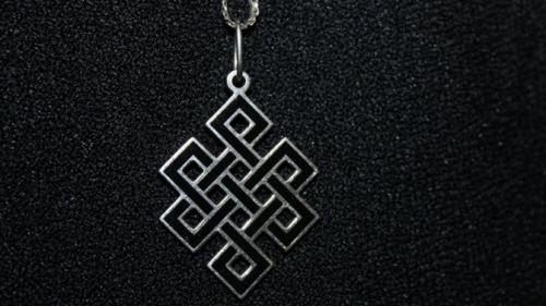 Тибетский узел бесконечности тату значение. Общая информация про тибетский узел бесконечности