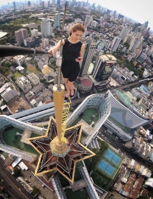 Сумасшедшее хобби - руфинг, которым занимается 24-летняя москвичка Ангелина николау. 04